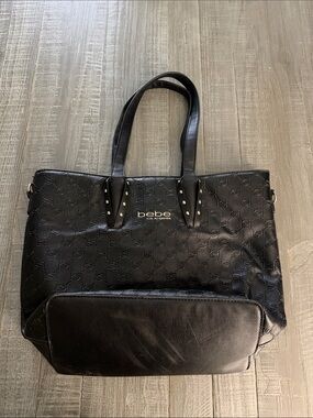 bebe Black Embossed Logo Tote with Stud Accents